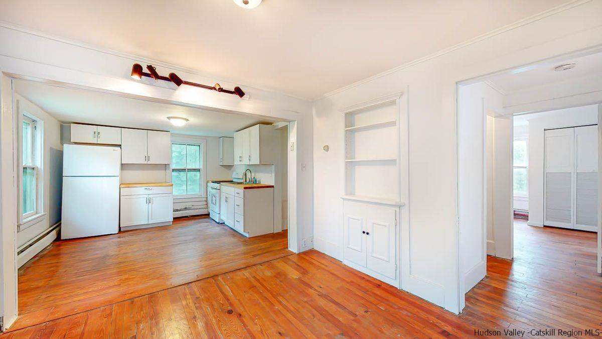 3418 Cooper Street Stone Ridge, NY 12484 - Photo 14 of 34 a view of a kitchen with wooden floor and a kitchen