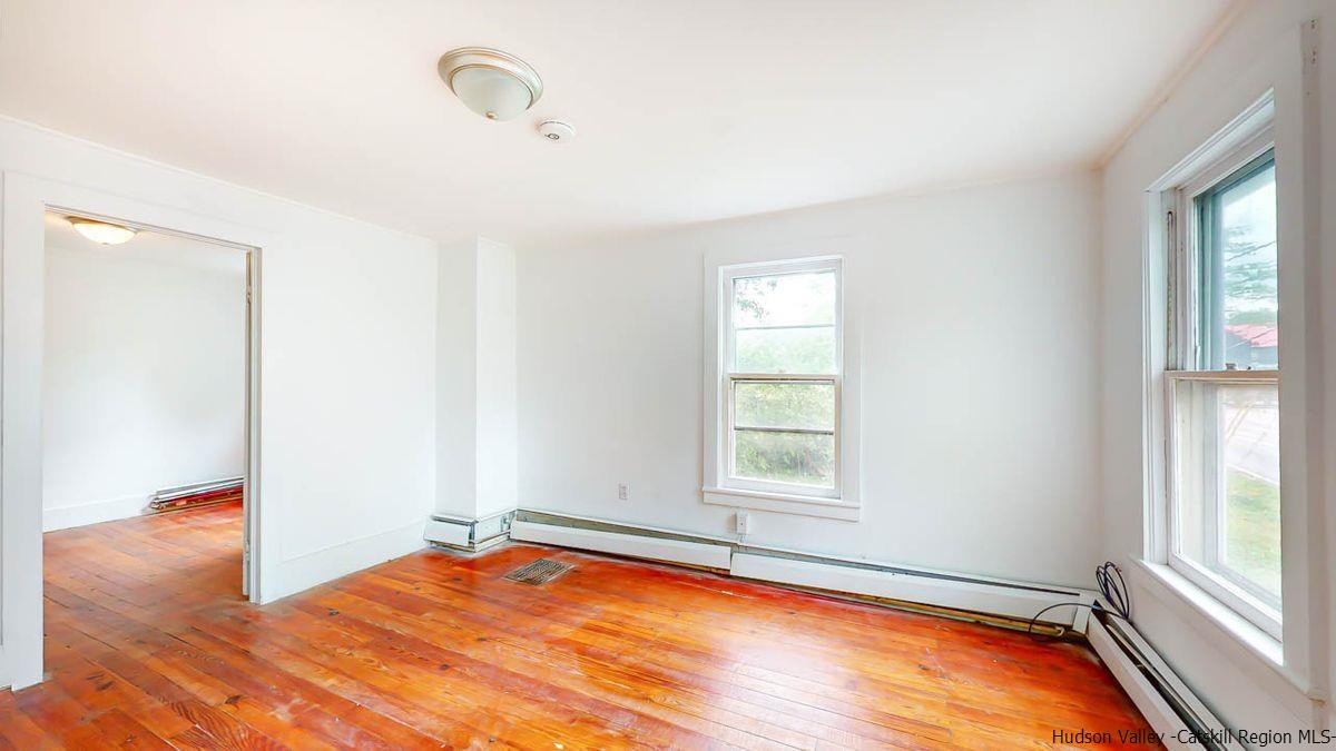 3418 Cooper Street Stone Ridge, NY 12484 - Photo 25 of 34 an empty room with windows