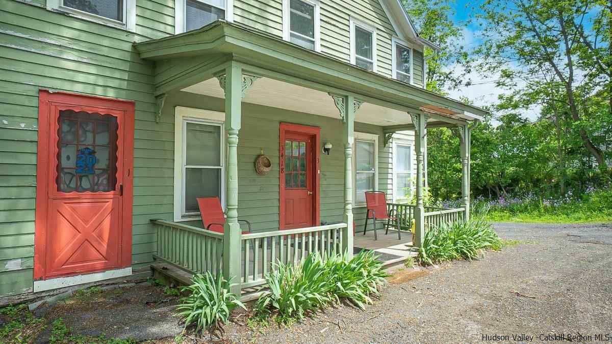 3418 Cooper Street Stone Ridge, NY 12484 - Photo 29 of 34 a view of a house with a small yard and plants
