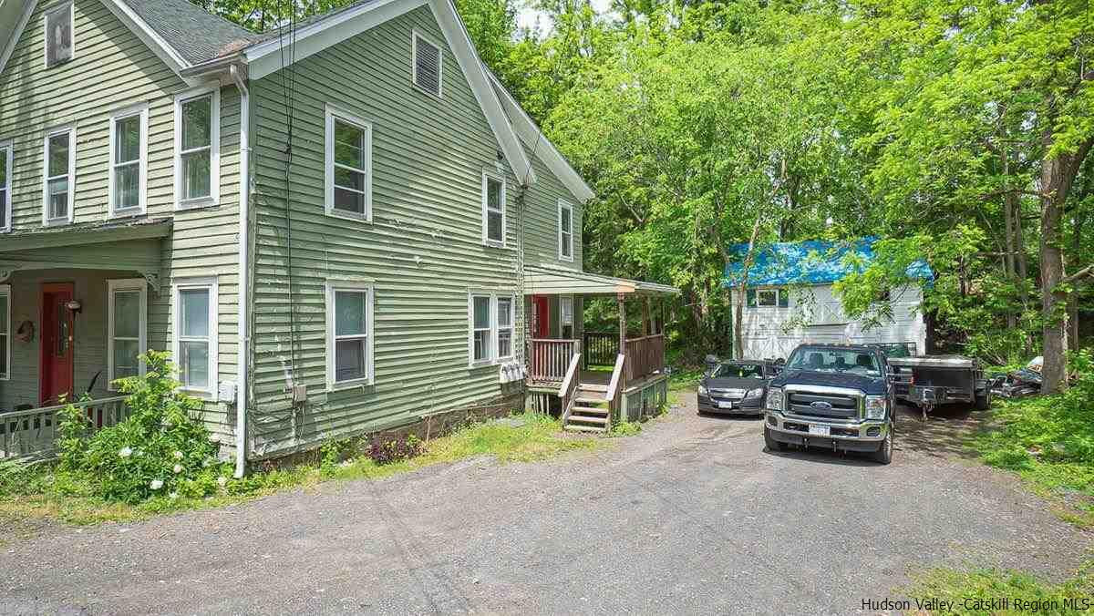 3418 Cooper Street Stone Ridge, NY 12484 - Photo 33 of 34 a car parked in front of a house