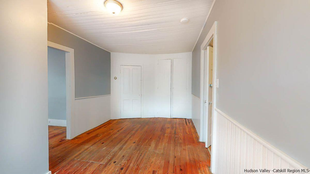 3418 Cooper Street Stone Ridge, NY 12484 - Photo 9 of 34 a view of a room with wooden floor