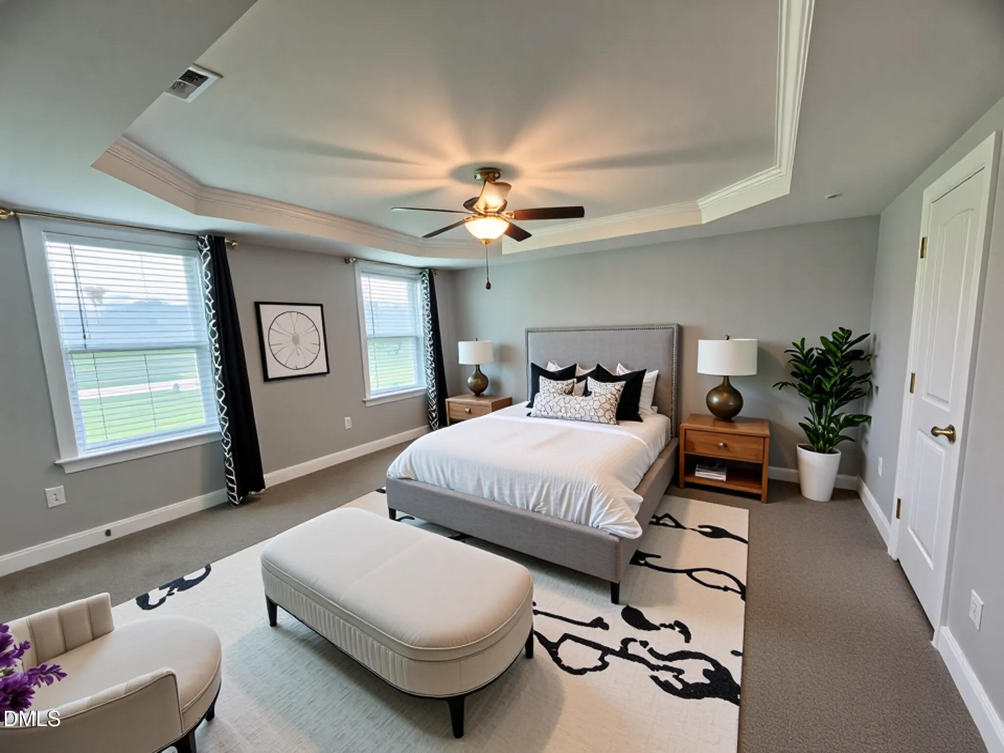 52 Shining Pearl Court Smithfield, NC 27577 - Photo 3 of 23 a bedroom with a bed and a chandelier