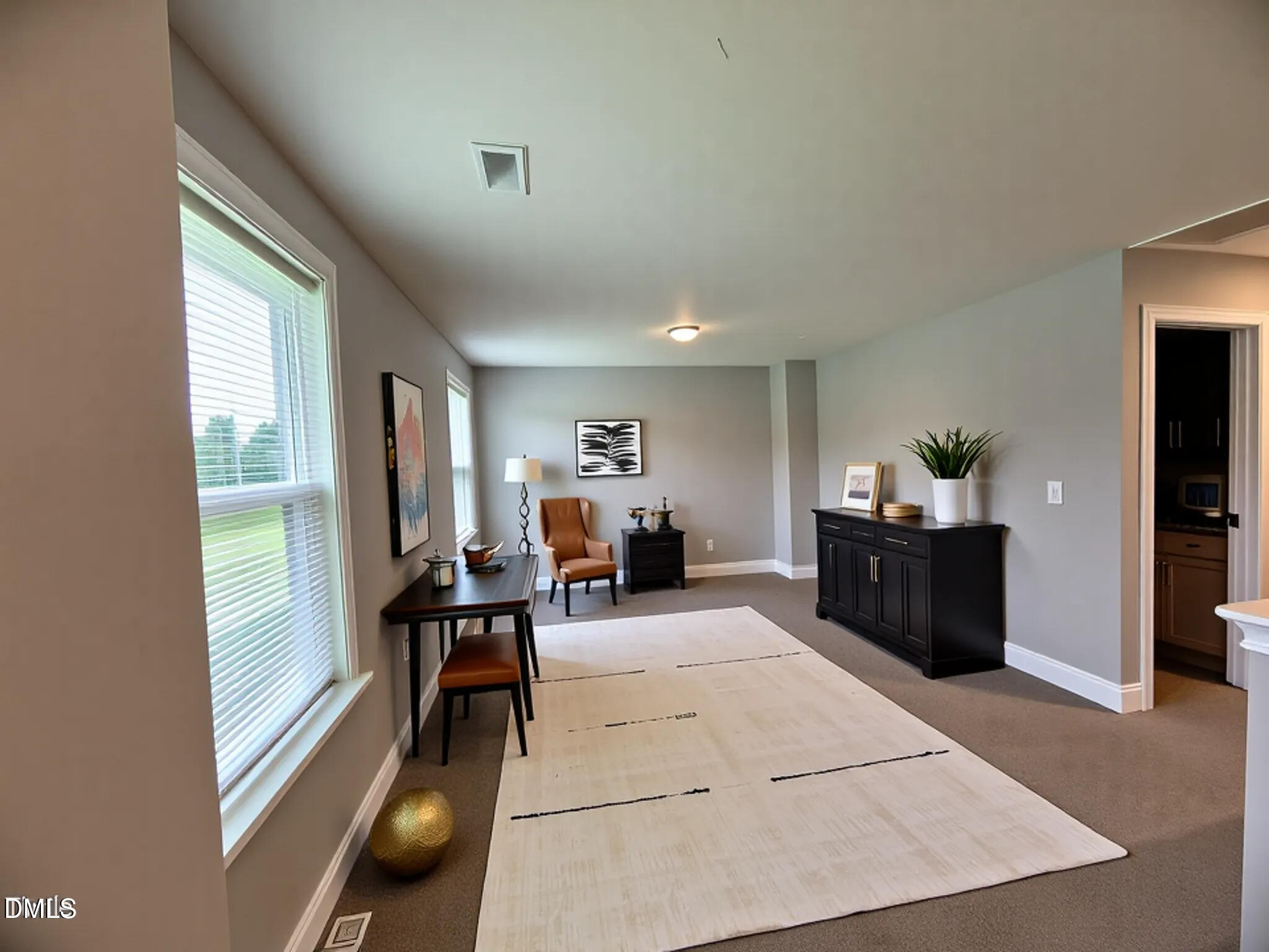 52 Shining Pearl Court Smithfield, NC 27577 - Photo 4 of 23 a view of a living room and dining room