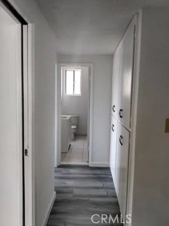 a view of a bathroom from a hallway