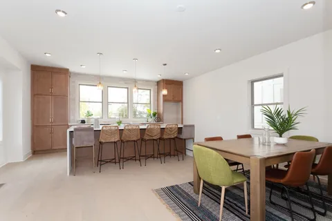 a view of a dining room with furniture