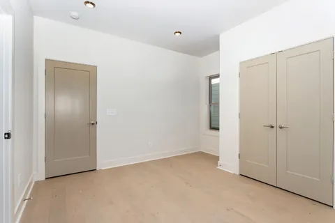a bathroom with a toilet a sink and bathtub