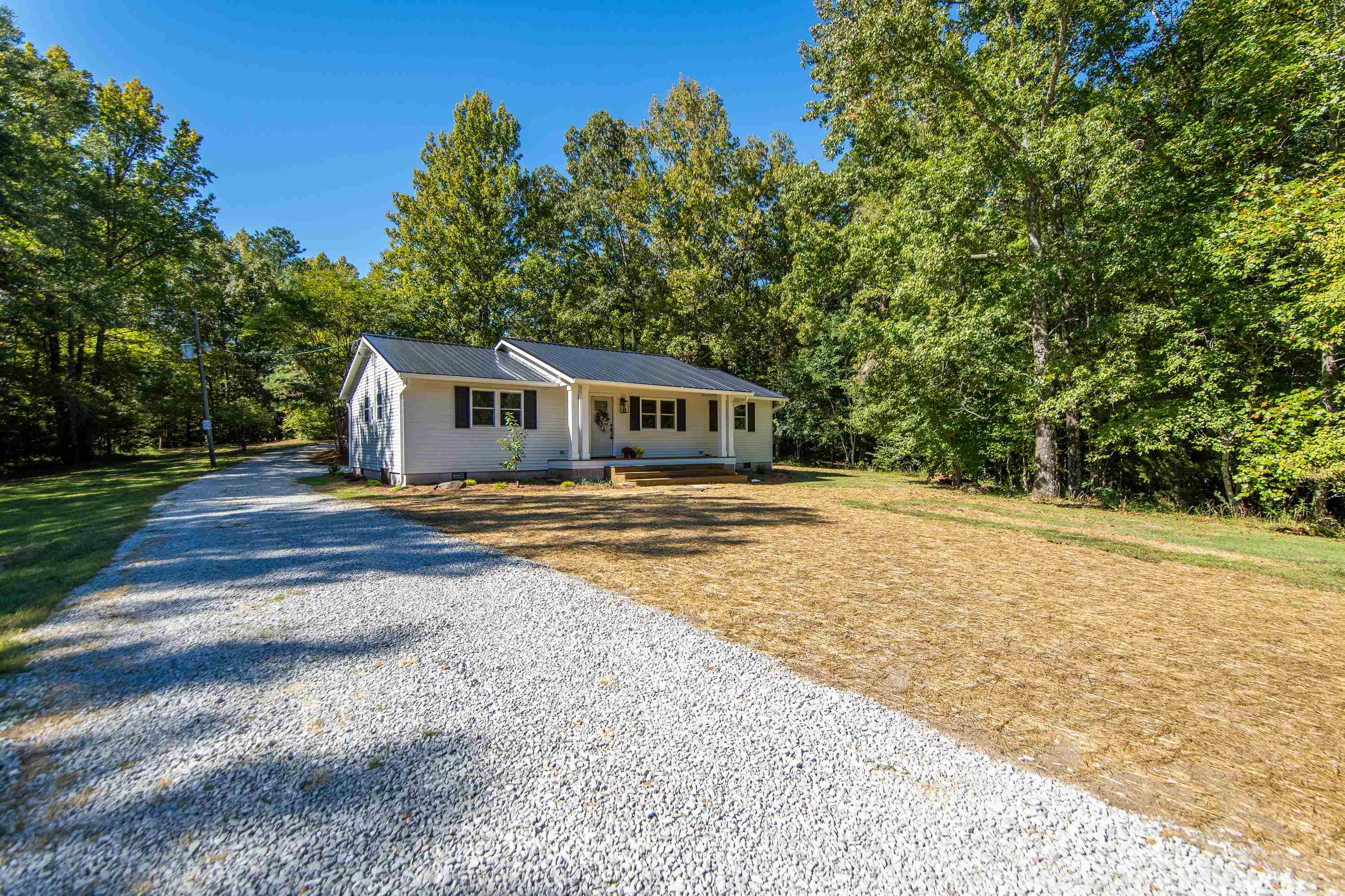 8254 57th Highway Ramer, TN 38367 - Photo 2 of 20 a house view with swimming pool in front of it