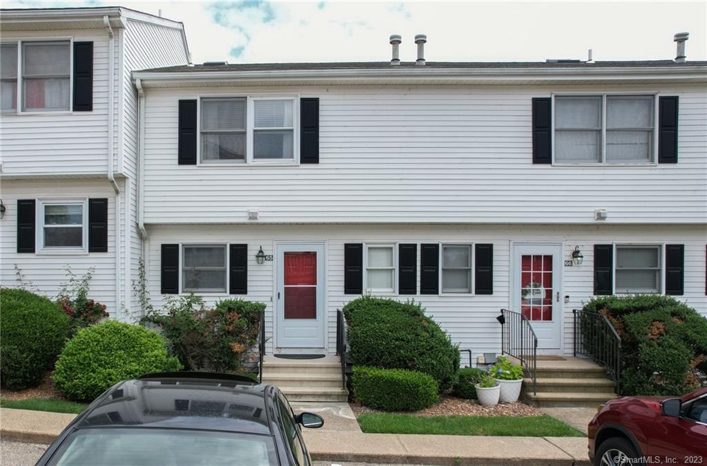 65 Commodore Cmns, Unit 65 Derby, CT 06418 - Photo 1 of 1 a view of a house with a patio