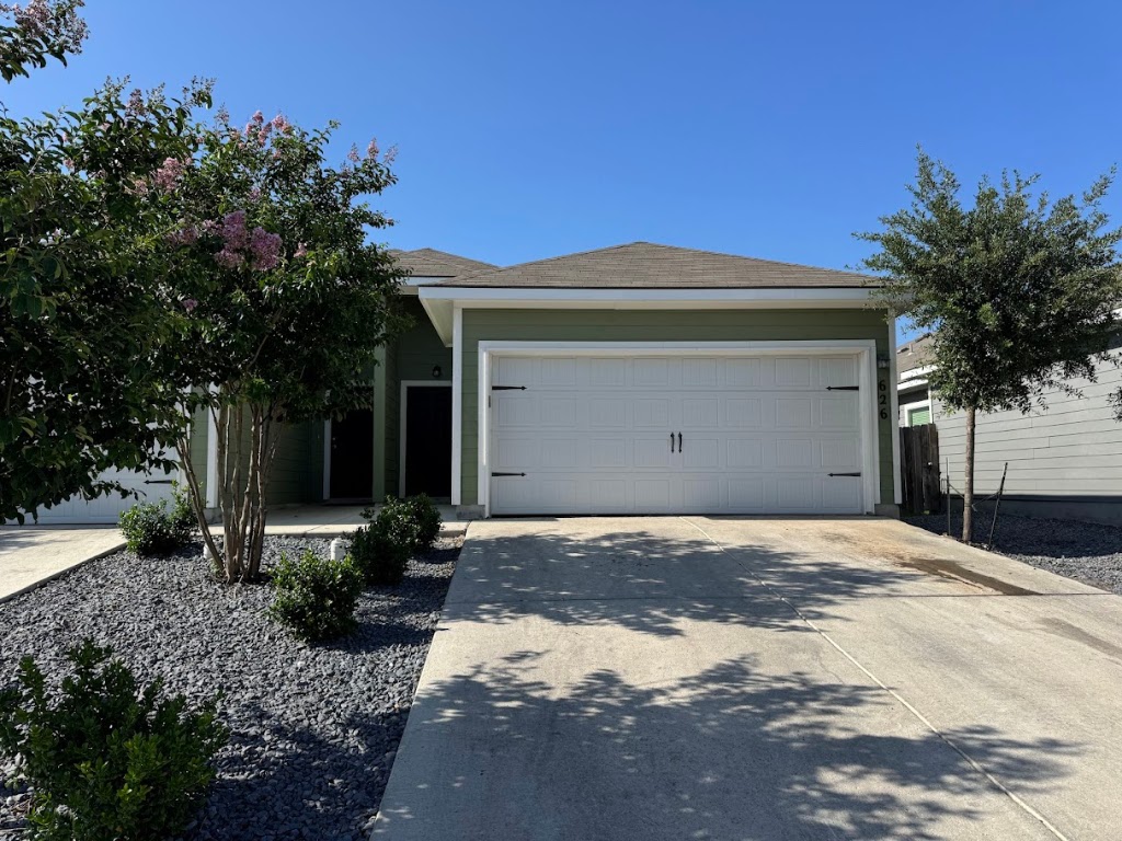 a house with trees in front of it