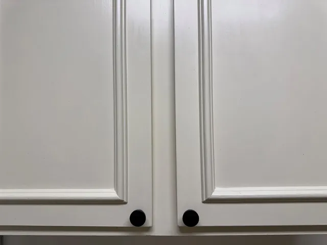 a view of gallery with wooden floor