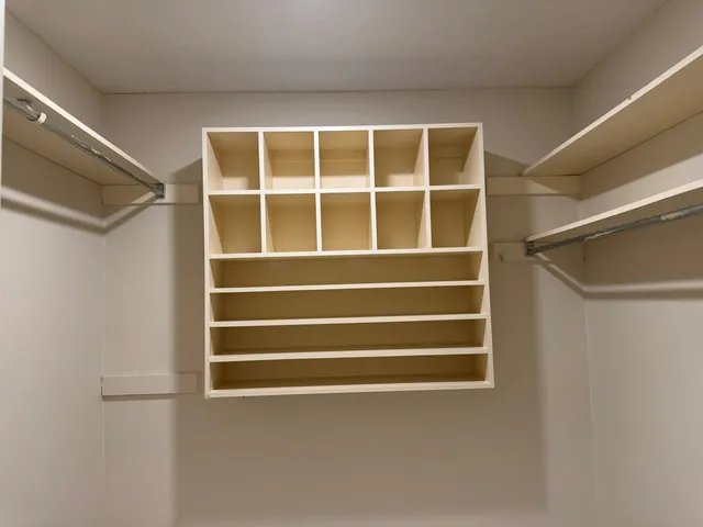 a bathroom with a shower and a sink