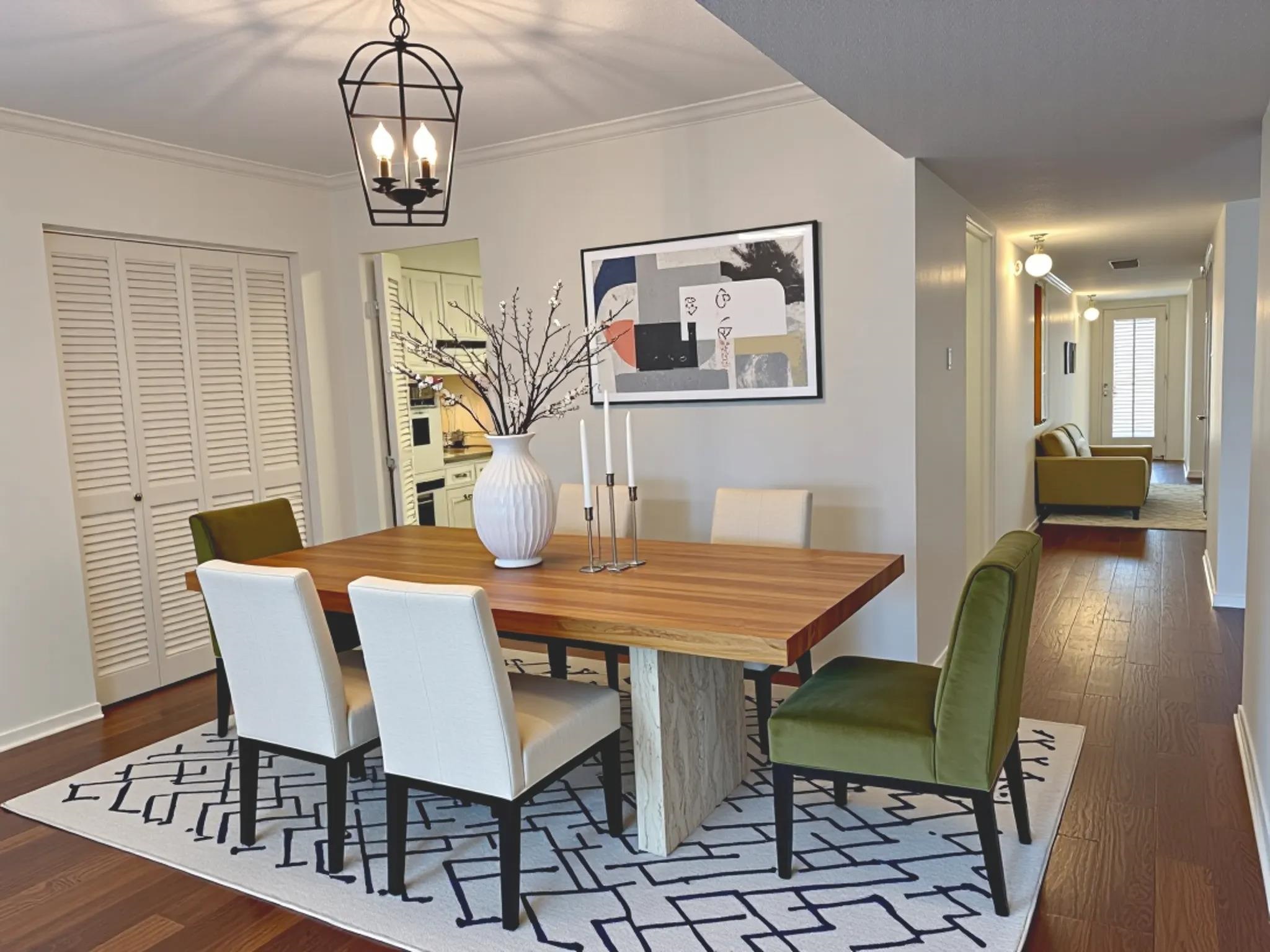 455 South Perkins Road, Unit 3 Memphis, TN 38117 - Photo 5 of 33 a view of a dining room with furniture wooden floor and chandelier