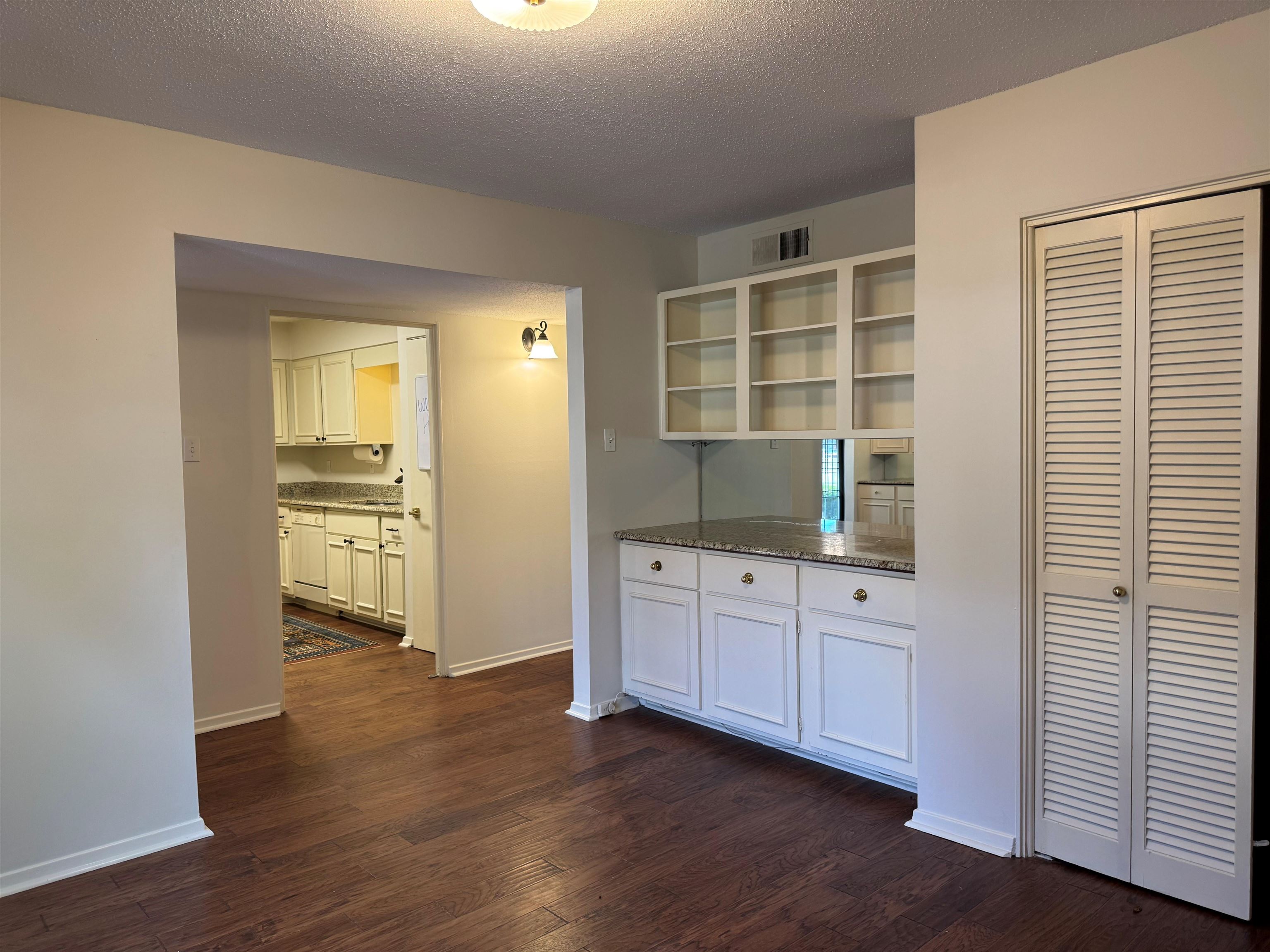 455 South Perkins Road, Unit 3 Memphis, TN 38117 - Photo 8 of 33 a view of a kitchen with wooden floor and cabinets