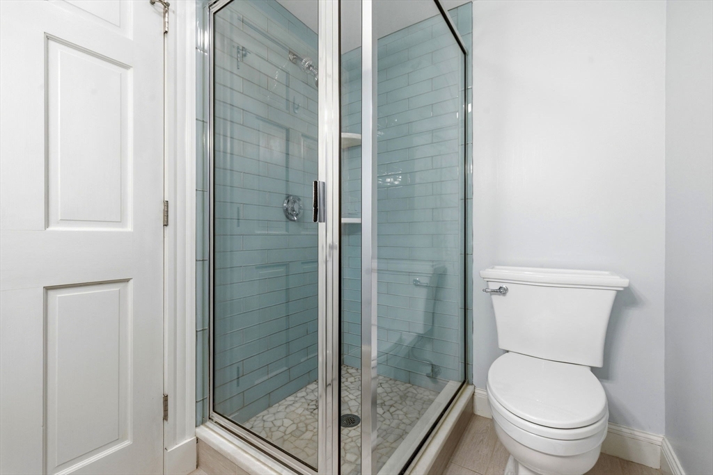 35 High Street, Unit 1 Boston, MA 02129 - Photo 15 of 33 a bathroom with a toilet and a shower