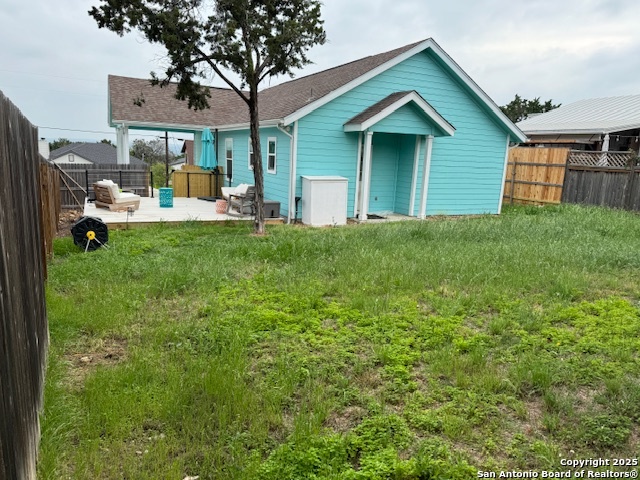 1285 Live Oak Drive Spring Branch, TX 78070 - Photo 7 of 17 a view of a house with a yard