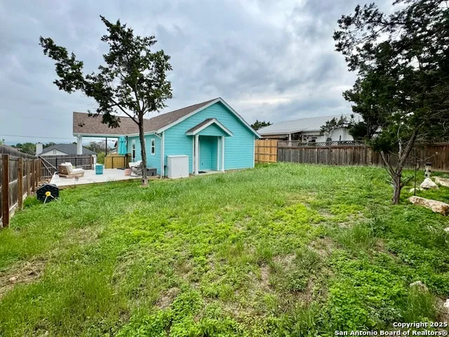 a house view with a garden space