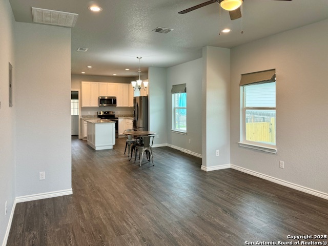 1285 Live Oak Drive Spring Branch, TX 78070 - Photo 9 of 17 a view of a kitchen with dining table and chairs