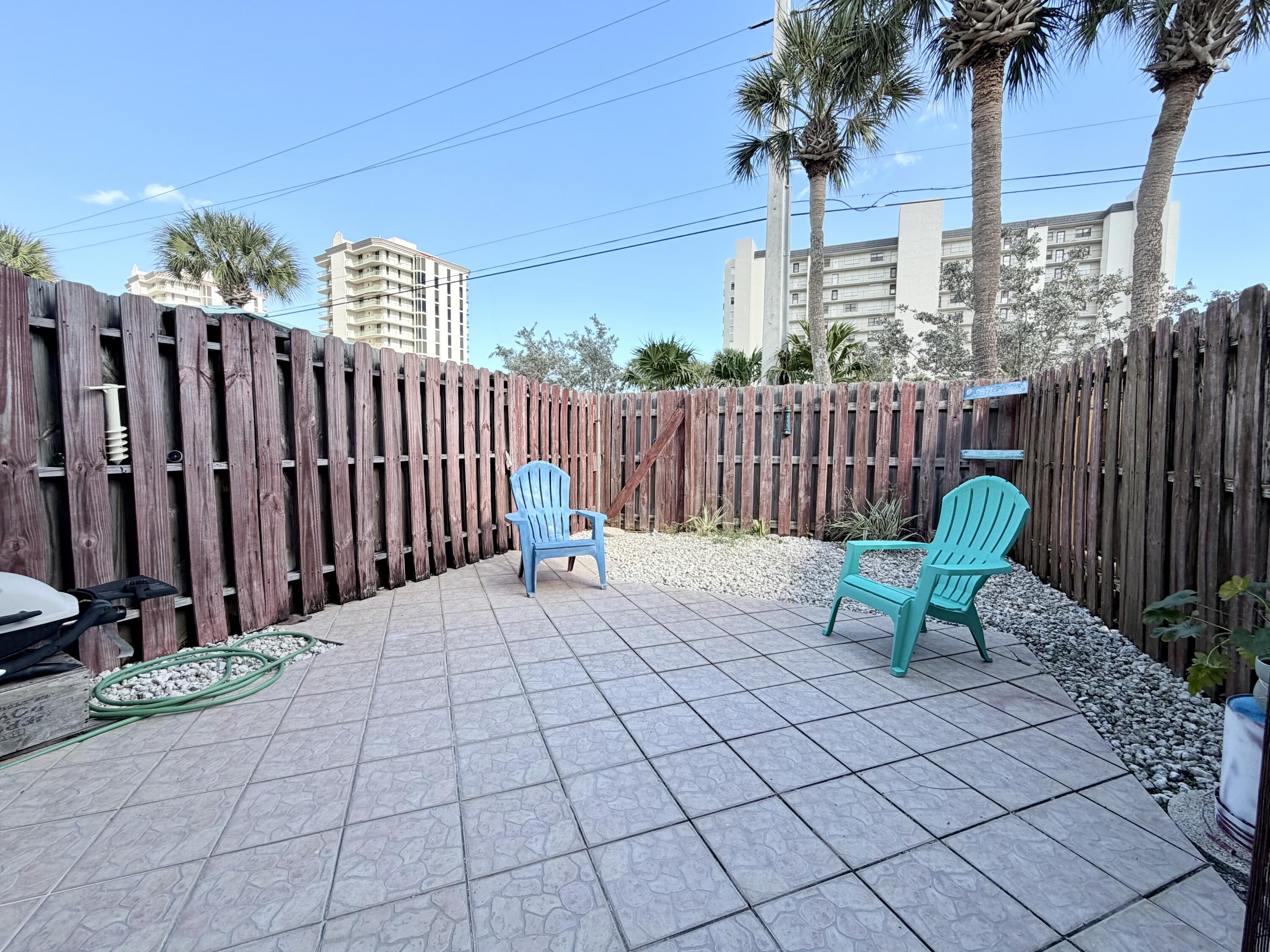4235 North Hwy A1A, Unit 14 Hutchinson Island, FL 34949 - Photo 17 of 36 a view of a chairs setting on the roof deck