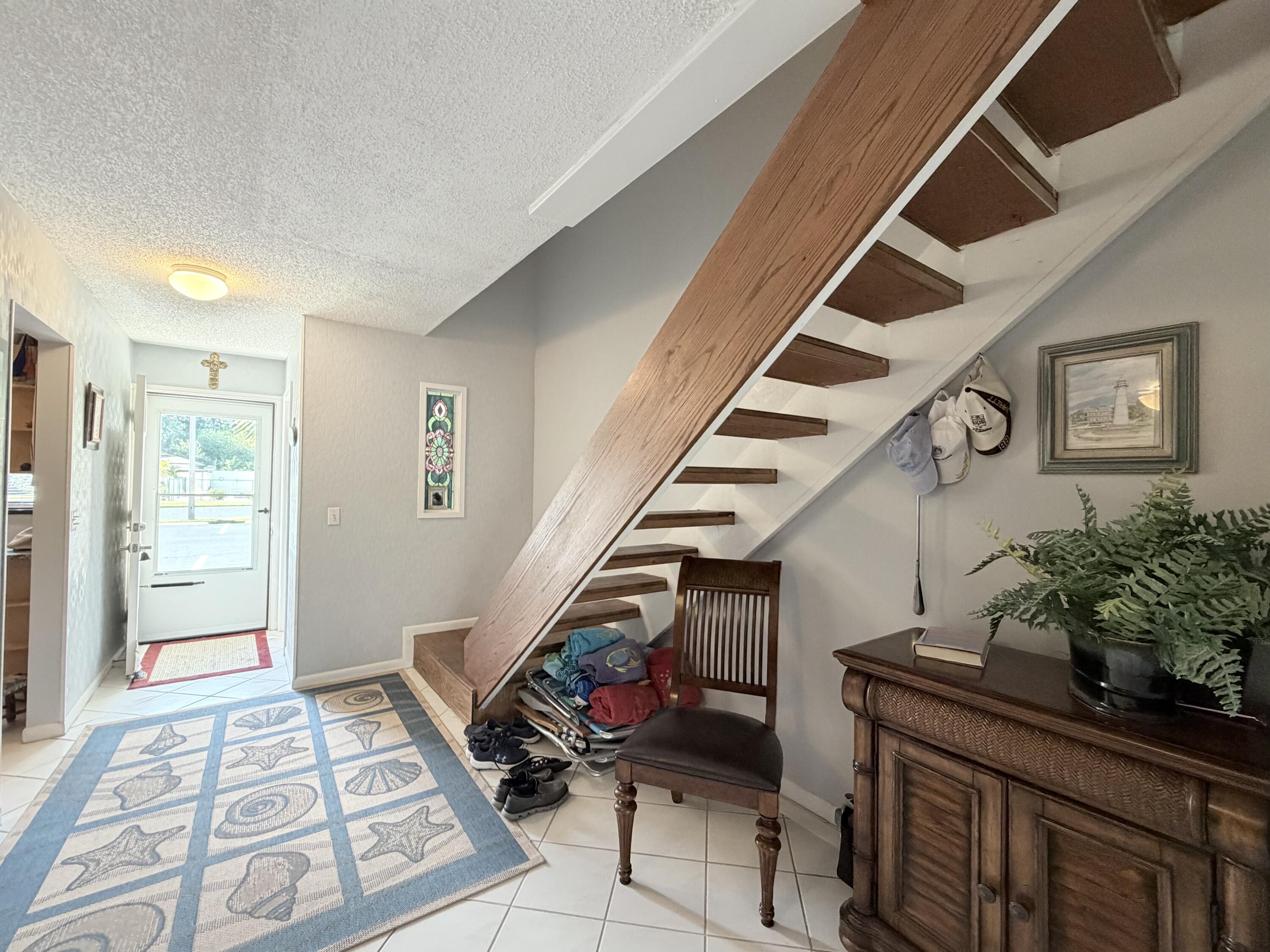 4235 North Hwy A1A, Unit 14 Hutchinson Island, FL 34949 - Photo 18 of 36 a living room with furniture
