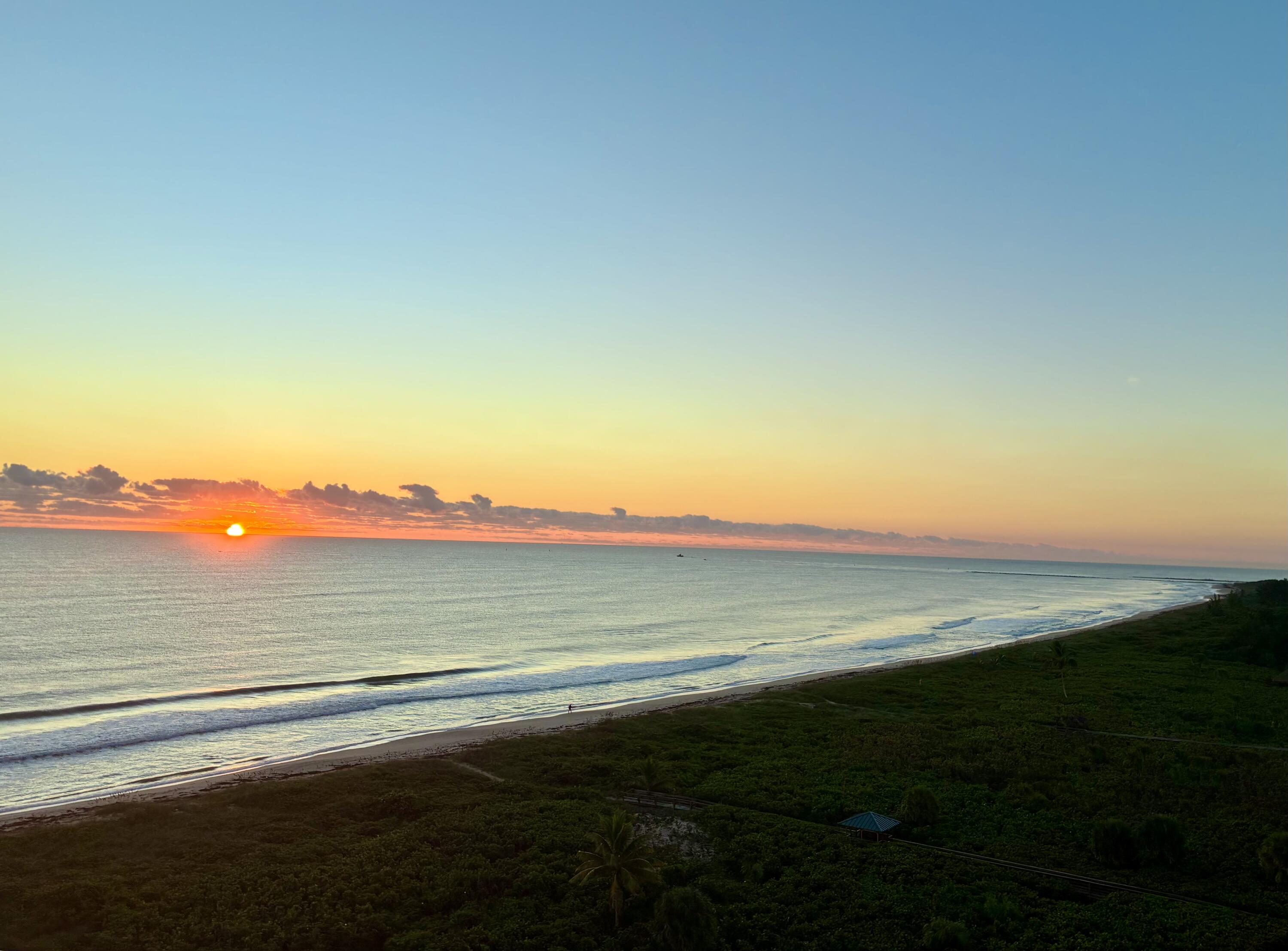4235 North Hwy A1A, Unit 14 Hutchinson Island, FL 34949 - Photo 35 of 36 a view of an ocean beach