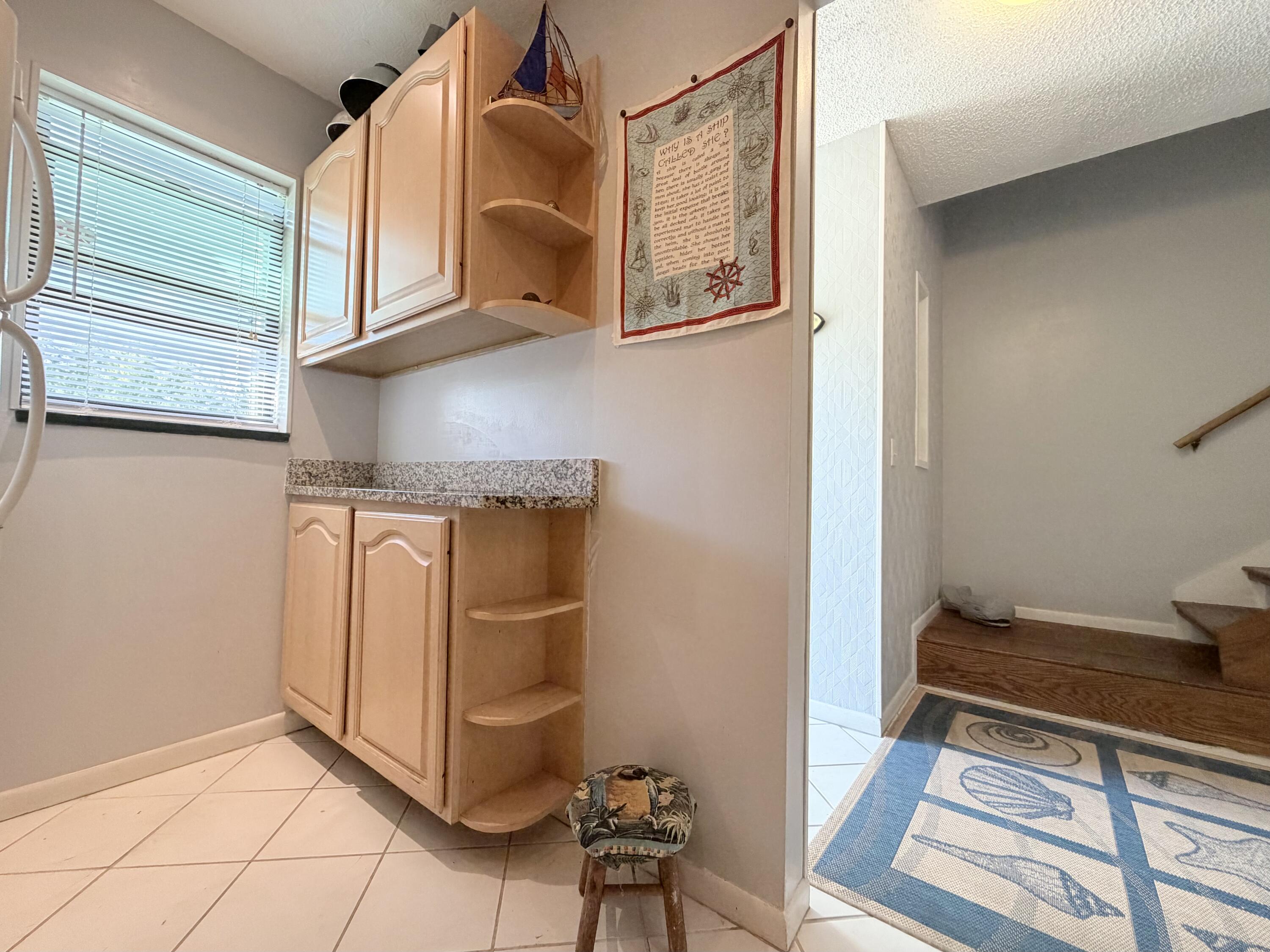 4235 North Hwy A1A, Unit 14 Hutchinson Island, FL 34949 - Photo 6 of 36 a view of utility room