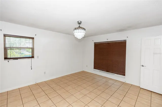 a bathroom with a sink vanity mirror and toilet