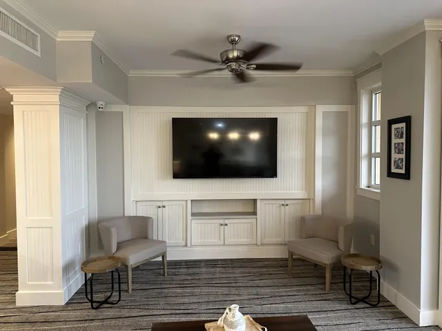 a view of a living room and bathroom