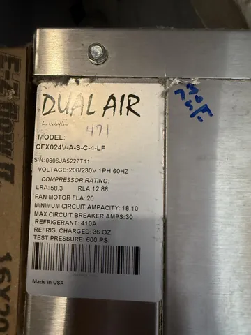 a large living room with furniture and flat screen tv