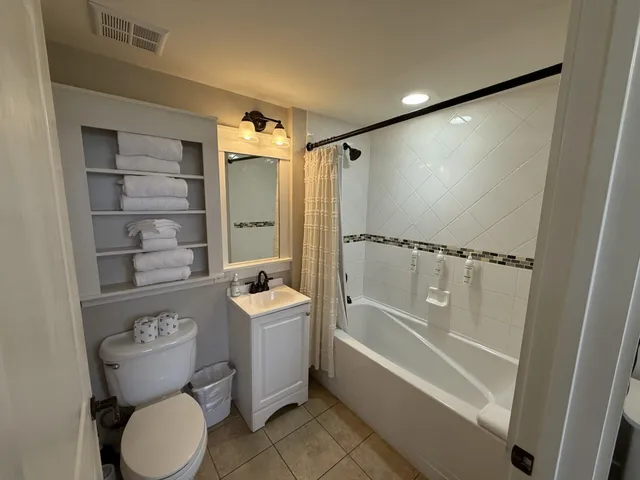 a living room with furniture and a gate