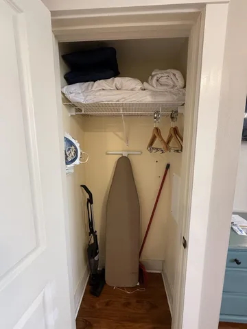 a view of a terrace with couches and sky view