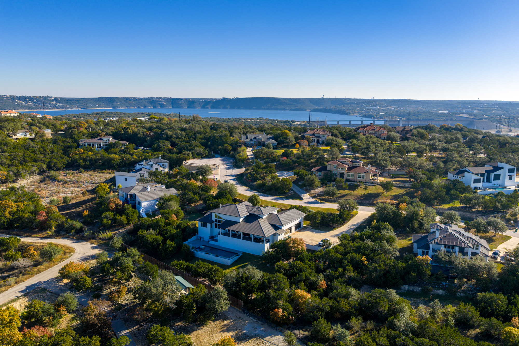 14900 Copper Ridge Lane Austin, TX 78734 - Photo 37 of 39 Aerial view of residential area featuring a nearby body of water