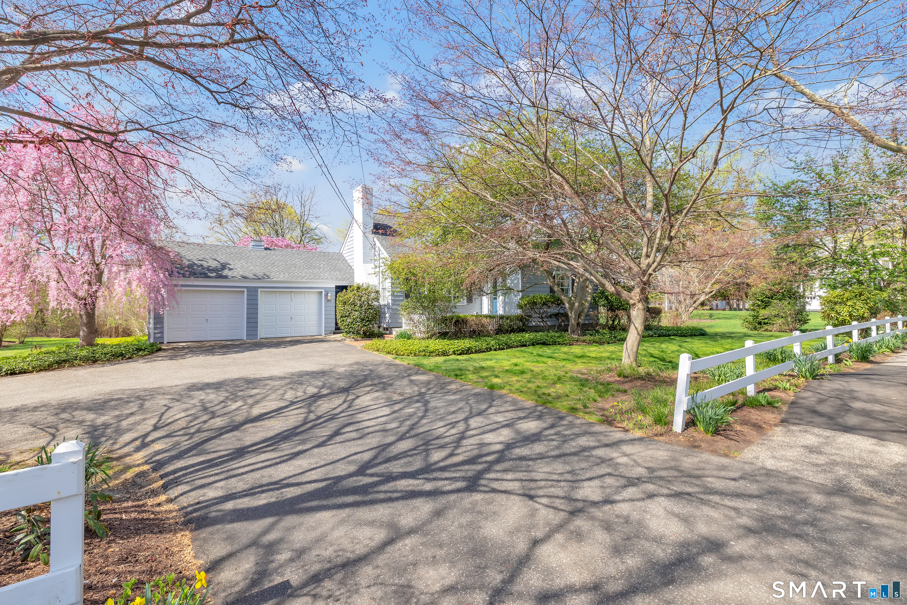 364 Beach Road Fairfield, CT 06824 - Photo 1 of 40 a view of a house with yard and tree s