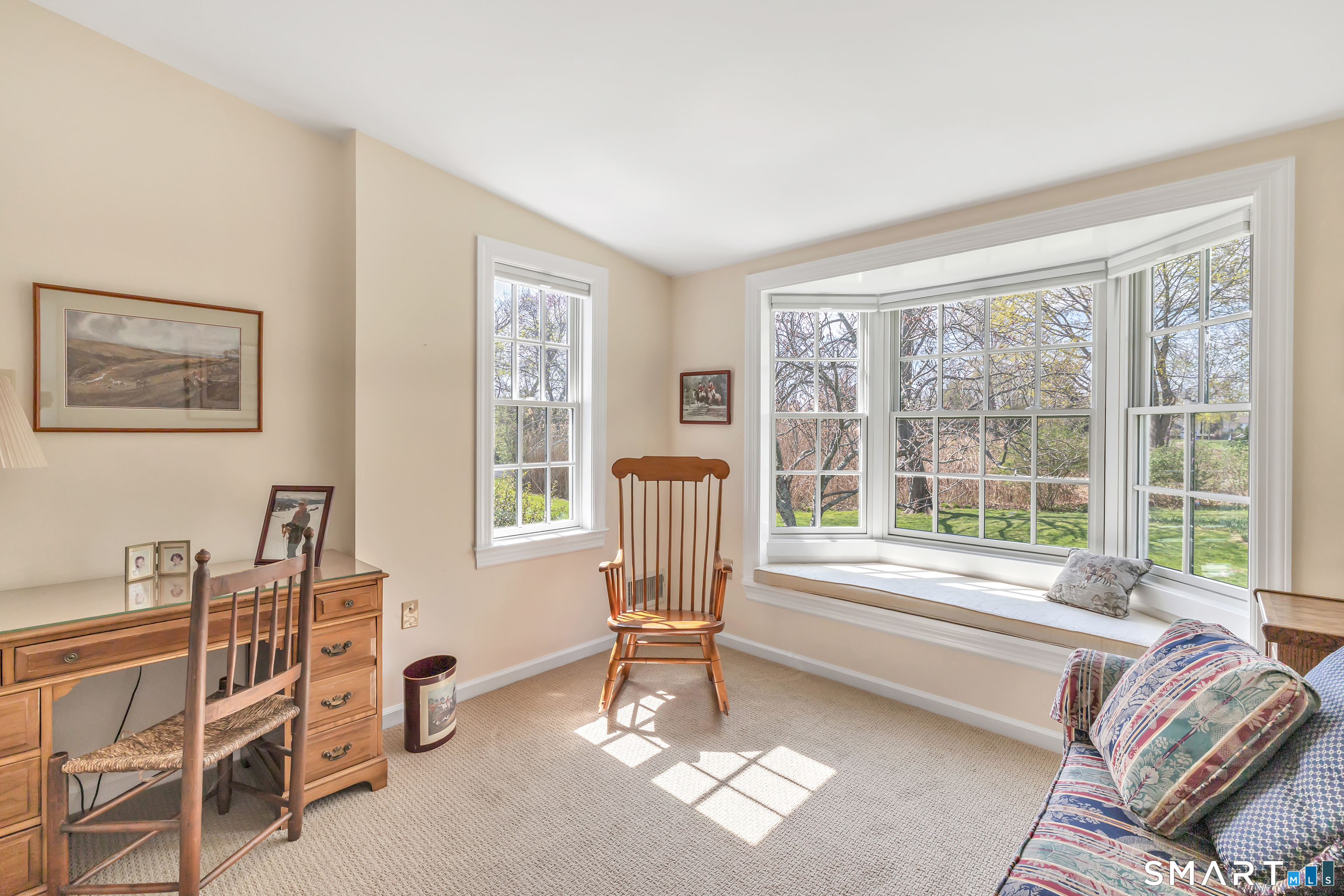 364 Beach Road Fairfield, CT 06824 - Photo 29 of 40 a living room with furniture and a large window