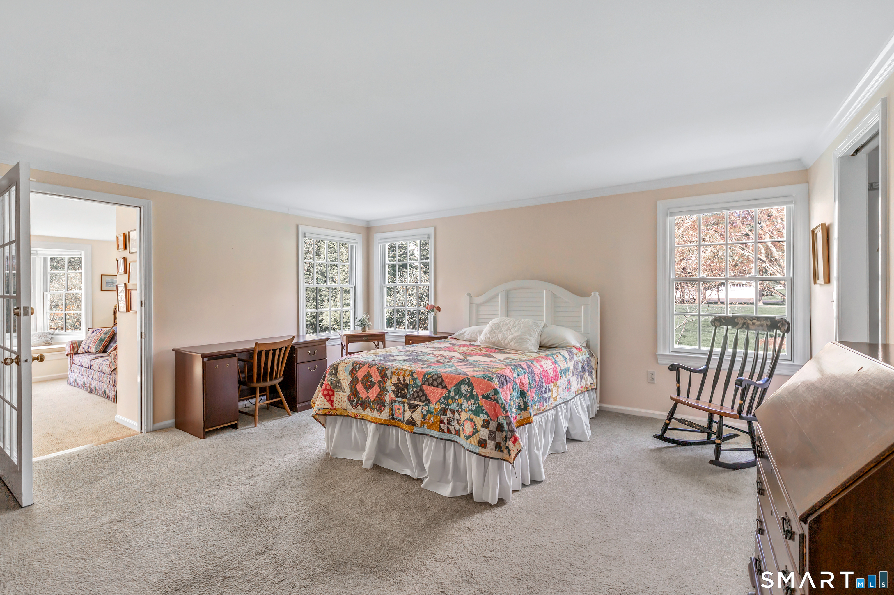 364 Beach Road Fairfield, CT 06824 - Photo 31 of 40 a bedroom with a bed chair and a window