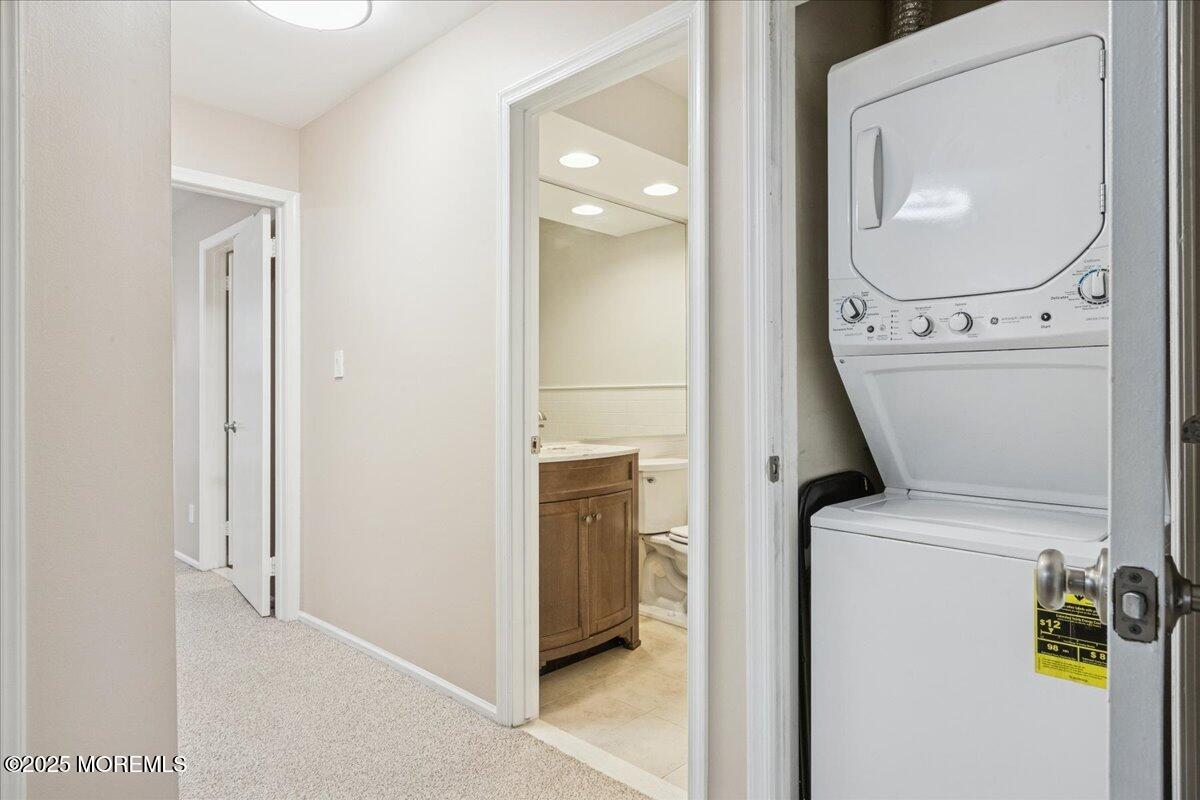 8 White Oak Court Howell, NJ 07731 - Photo 12 of 17 a view of a storage & utility room with a washer dryer