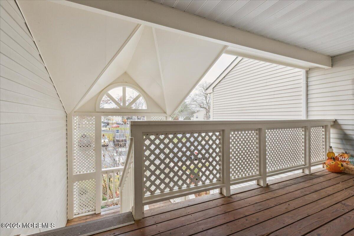 8 White Oak Court Howell, NJ 07731 - Photo 4 of 17 a view of wooden floor with a table and chairs