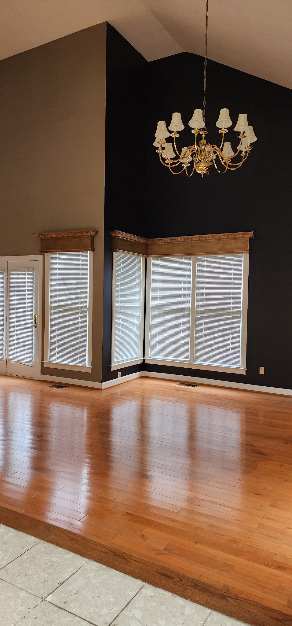 1128 Fairways Lebanon, TN 37087 - Photo 5 of 48 a view of an empty room with wooden floor and a window