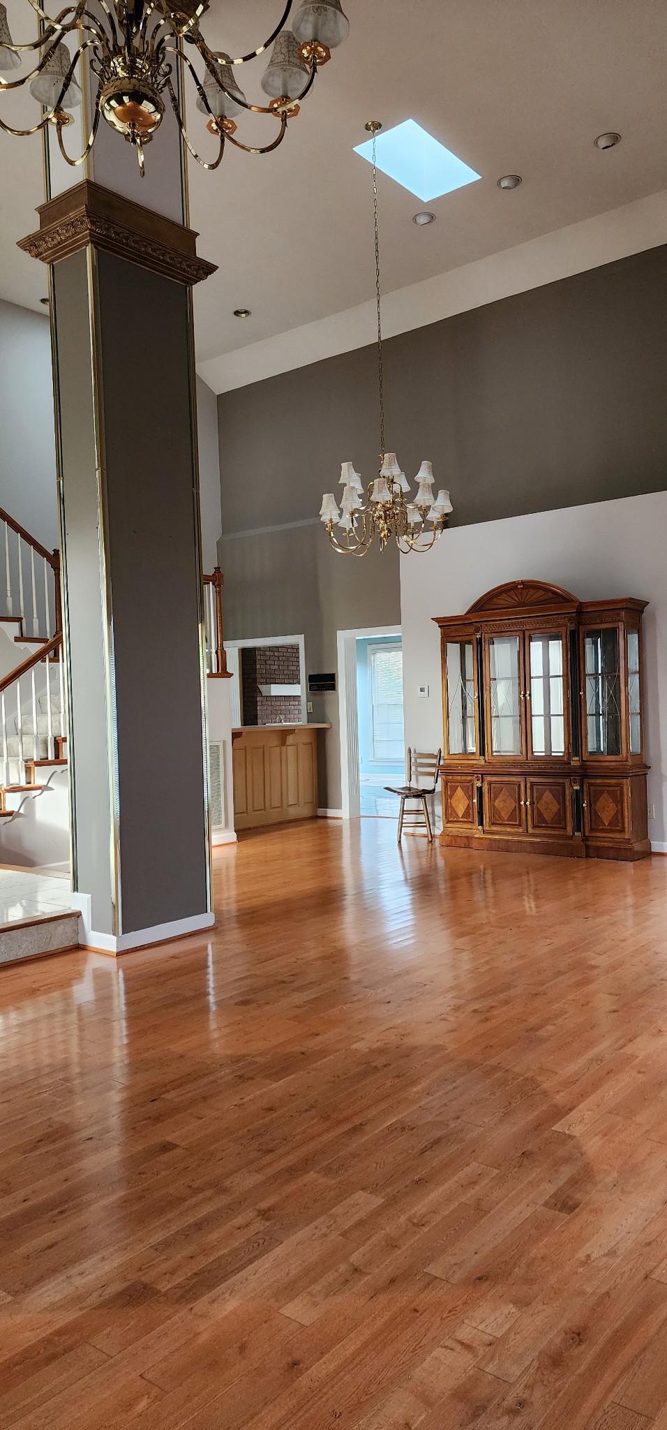 1128 Fairways Lebanon, TN 37087 - Photo 7 of 48 an empty room with wooden floor fireplace and windows