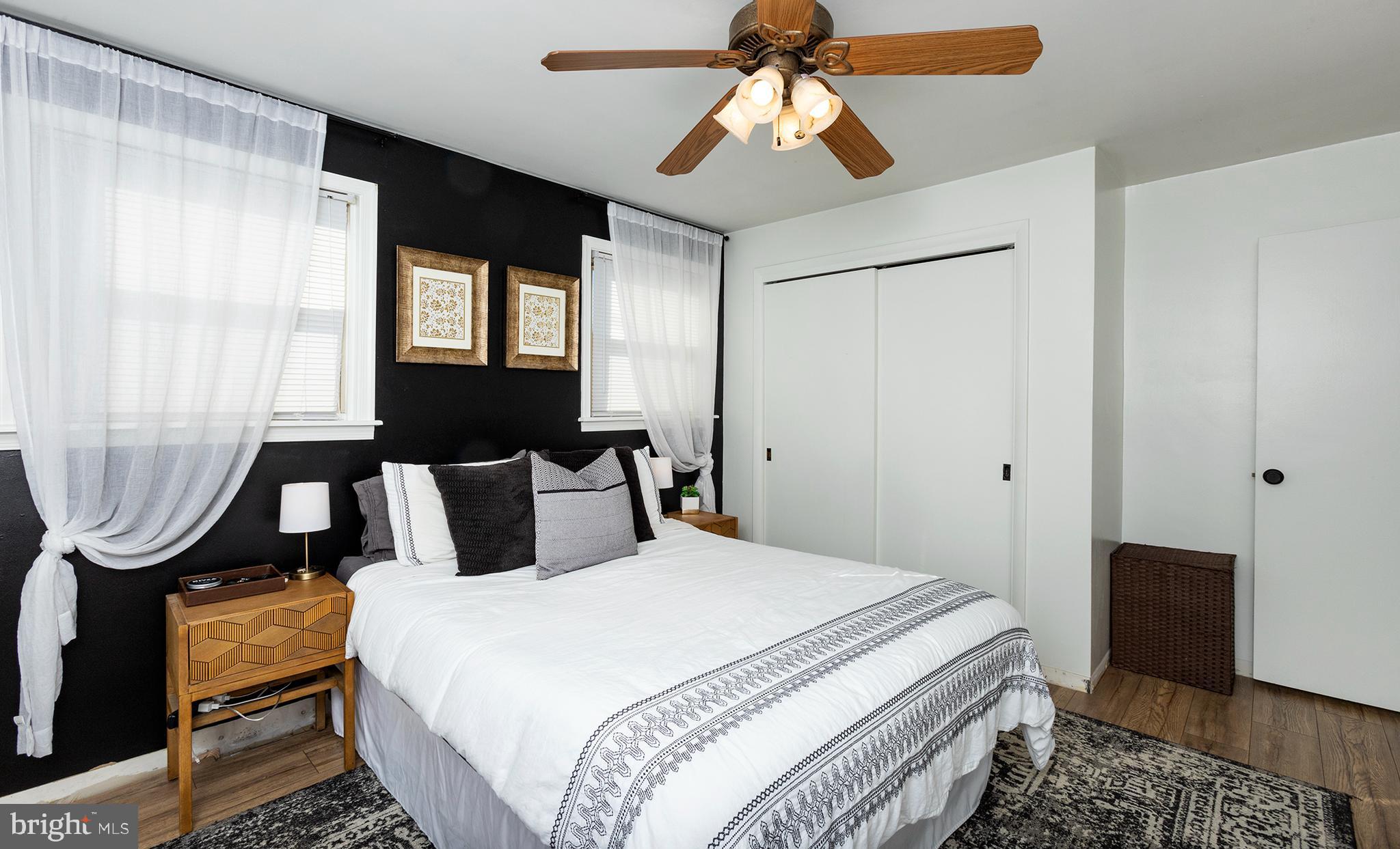 66 Runyon Road Hummelstown, PA 17036 - Photo 11 of 26 a bedroom with a bed a mirror and a window