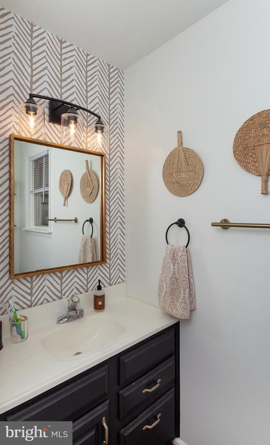 66 Runyon Road Hummelstown, PA 17036 - Photo 14 of 26 a bathroom with a sink and a mirror