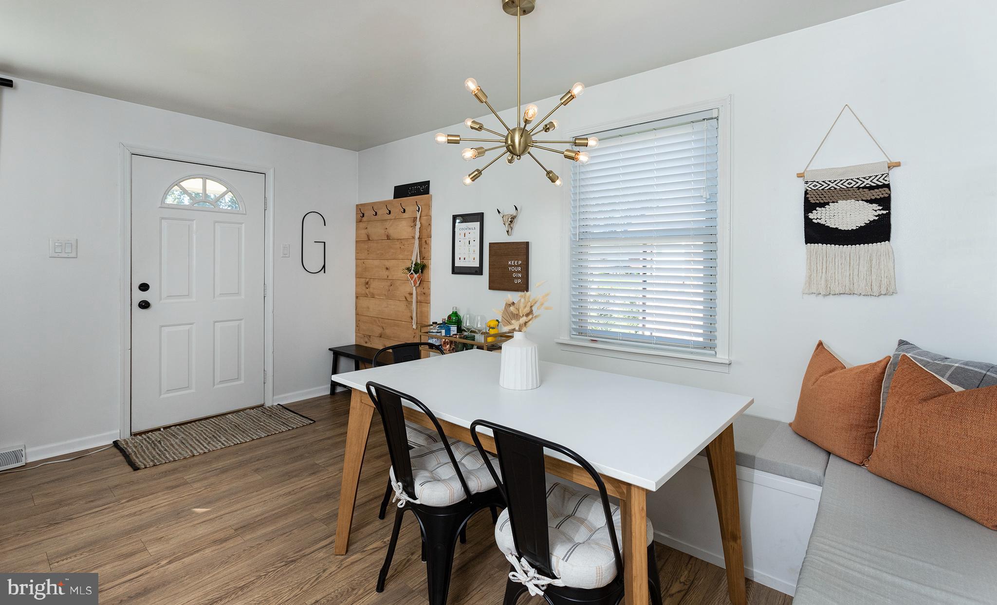 66 Runyon Road Hummelstown, PA 17036 - Photo 5 of 26 a view of a dining room with furniture and wooden floor