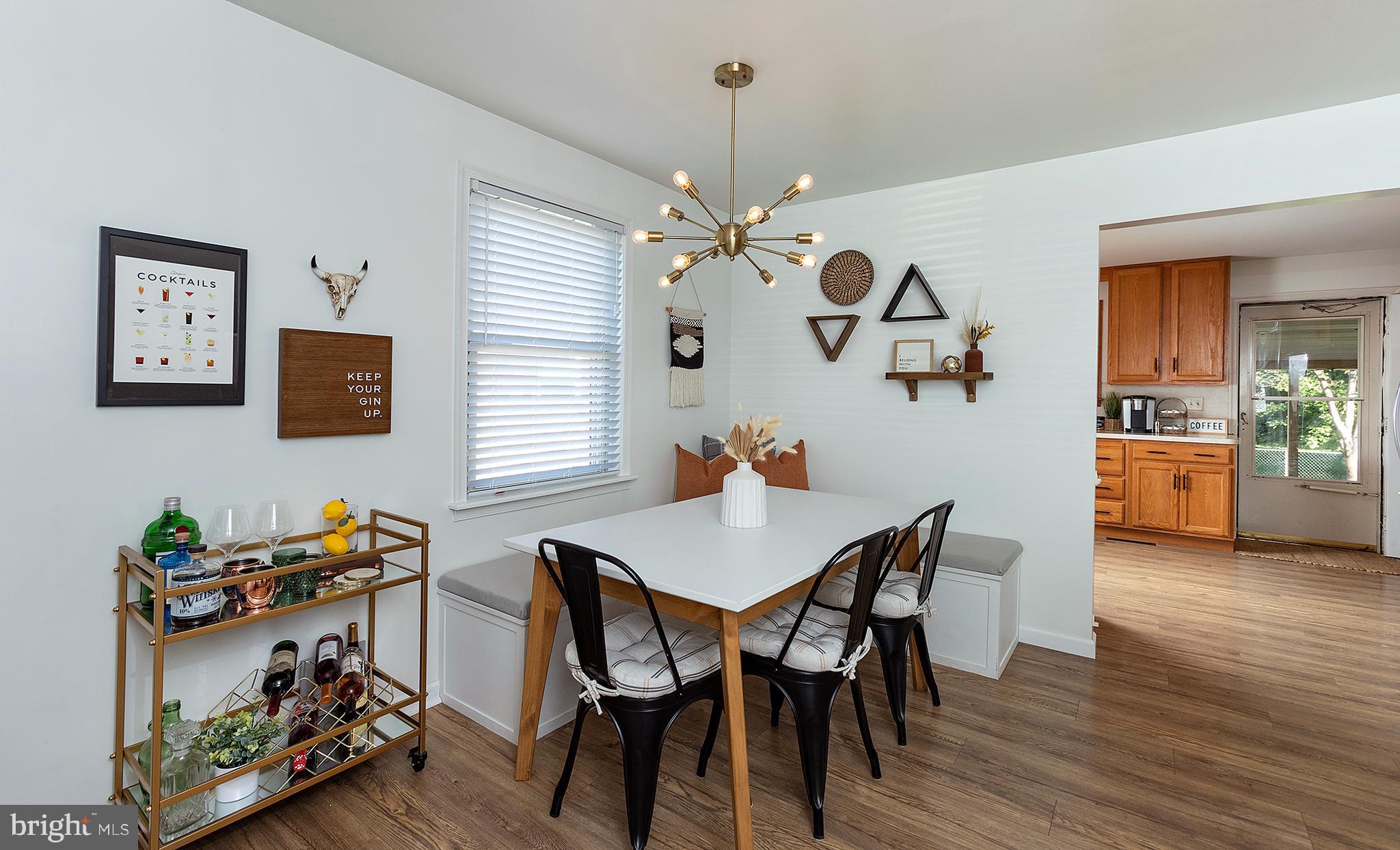 66 Runyon Road Hummelstown, PA 17036 - Photo 6 of 26 a view of a dining room with furniture and wooden floor
