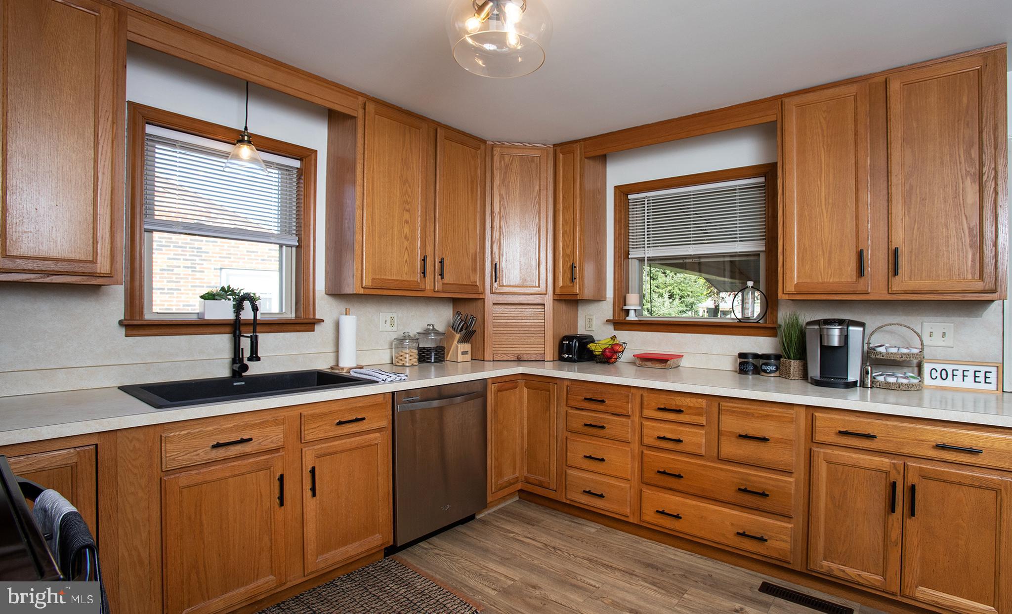 66 Runyon Road Hummelstown, PA 17036 - Photo 7 of 26 a kitchen with sink cabinets and window