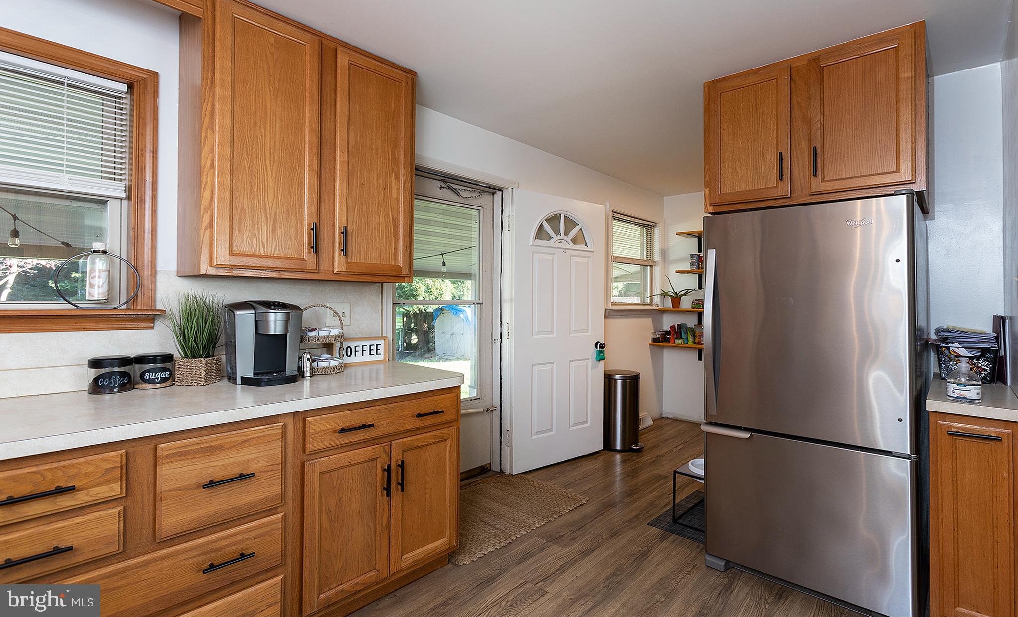 66 Runyon Road Hummelstown, PA 17036 - Photo 9 of 26 a kitchen with stainless steel appliances granite countertop a refrigerator sink and cabinets