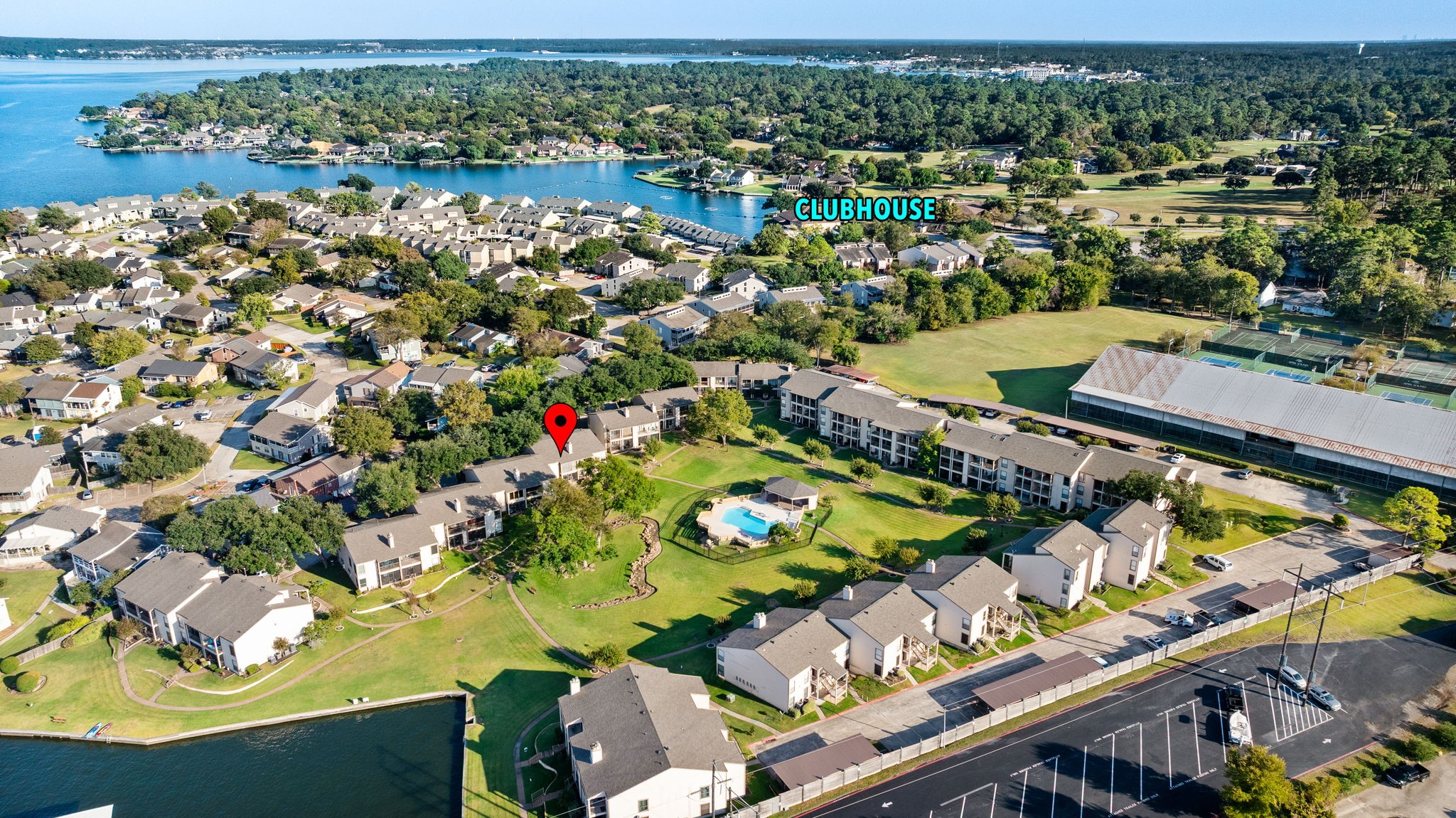204 Lakeview Terrace, Unit G Conroe, TX 77356 - Photo 26 of 26 an aerial view of a city