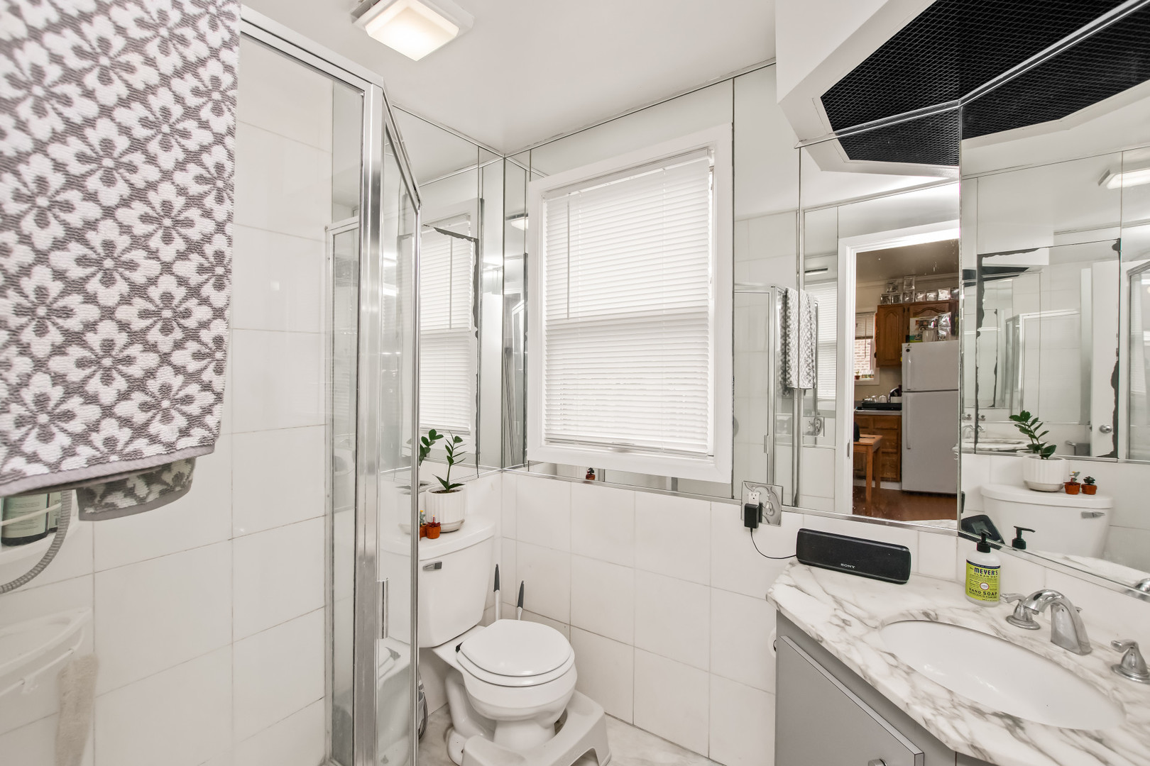 2238 West 21st Place Chicago, IL 60608 - Photo 24 of 37 a bathroom with a granite countertop sink toilet and shower