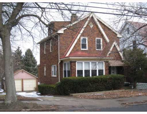 Exterior Front. Extra Wide lot on  Tree Lined Street