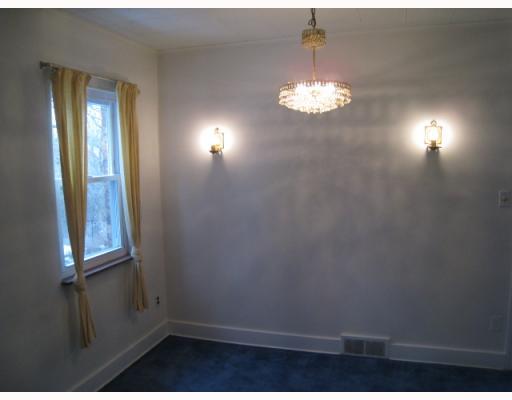 Dining Room. Open Formal Dining Room with Sconces