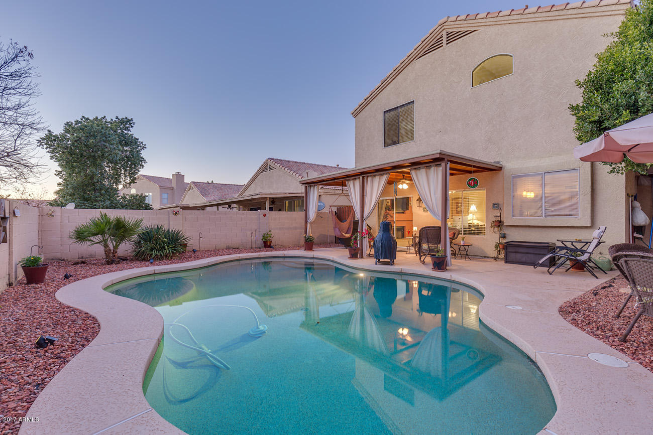 11255 West Piccadilly Road Avondale, AZ 85392 - Photo 7 of 29 aerial view of a swimming pool with a patio