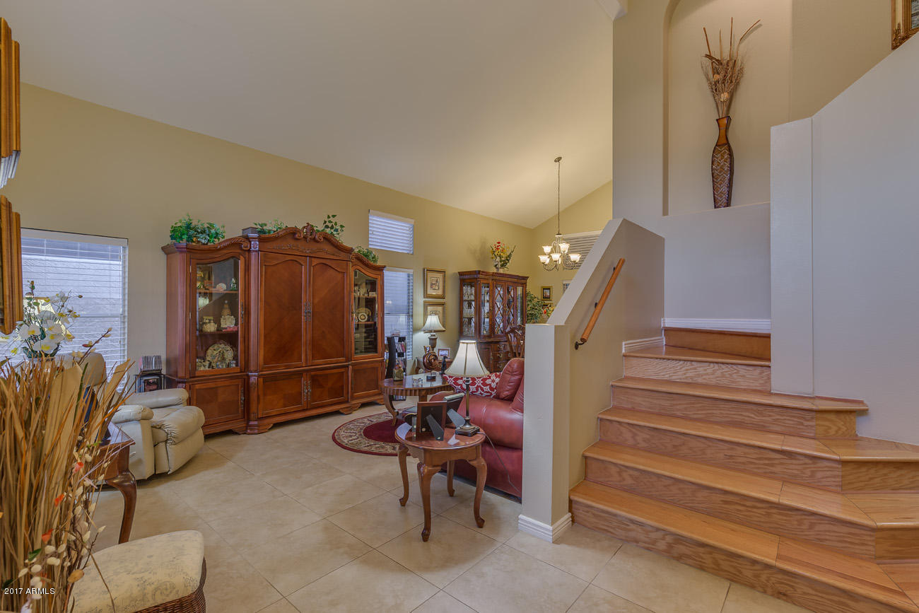 11255 West Piccadilly Road Avondale, AZ 85392 - Photo 9 of 29 a view of entryway with workspace and stairs
